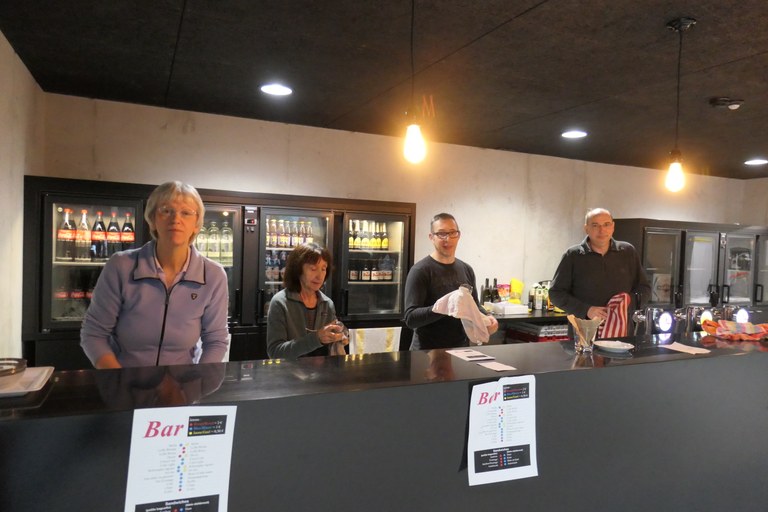 Staff behind the bar